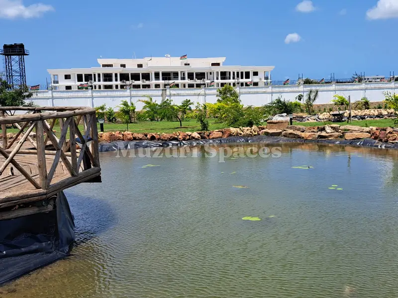 Large pond with a timber bridge, Kilifi park