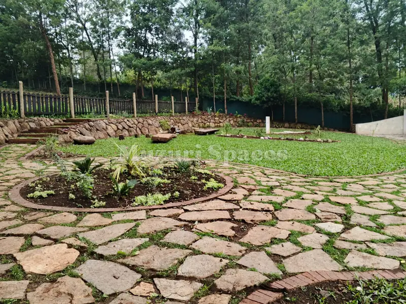 Crazy-paving circle around a planted bed, Memorial Garden